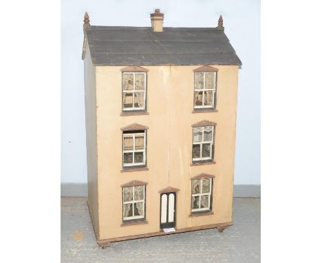 Late Victorian painted pine dolls house, the front with six sash windows, the back with two doors opening to reveal three flo