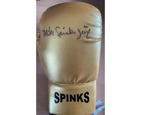 Michael Spinks signed Gold Personalised boxing glove. Michael Spinks (born July 13, 1956) is an American former professional 