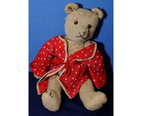 1920's jointed teddy bear (possibly Bing) with redone felt pads, button eyes and wool stitched nose (approx. 34cm)