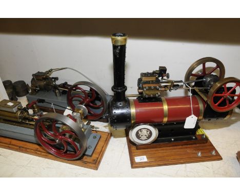 Scale model live steam stationary engine mounted on board with Pickering Traction Engine Rally 1972 badge and two associated 