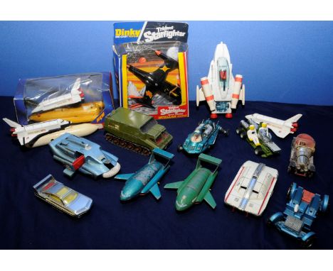 Box containing selection of Space related toys including Dinky Thunderbird 2 x 2 Dinky Spectrum Pursuit vehicle from Captain 