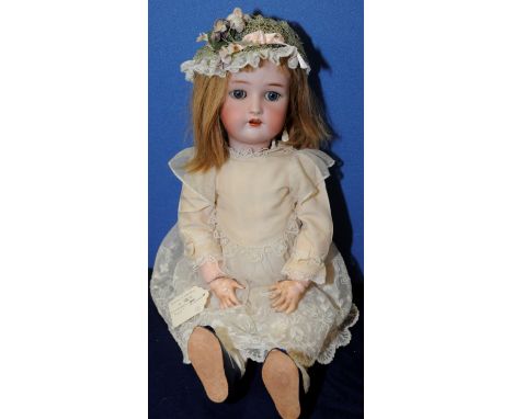Simon & Halbig for Krammer with impressed marks to base of head  Simon Helbig K star R bisque head doll on composition body w