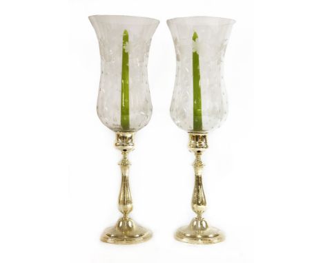 A pair of Christofle and Co. silver-plated hurricane lamps,each with an acid etched and cut-glass bellflower-shaped shade, on