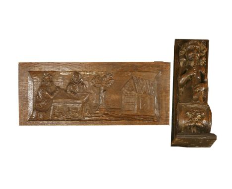 A carved oak term playing a lute,mounted on a later backboard,36cm high, anda carved oak panel,19th century, depicting a husb