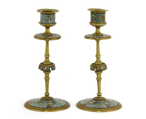 A pair of French brass candlesticks,c.1880, each with a champlevé enamel turquoise ground,18cm high (2)
