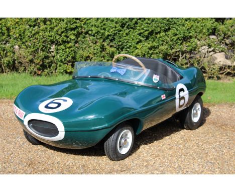 A Cheetah Cub Jaguar D-Type/XKSS child's car by Watsonian, 1960stubular steel chassis, fibreglass moulded body painted in Bri