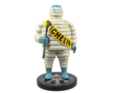 A hand-painted 'Mr Bibendum' standing forecourt display figure,modern, fibreglass construction, depicting the Michelin advert