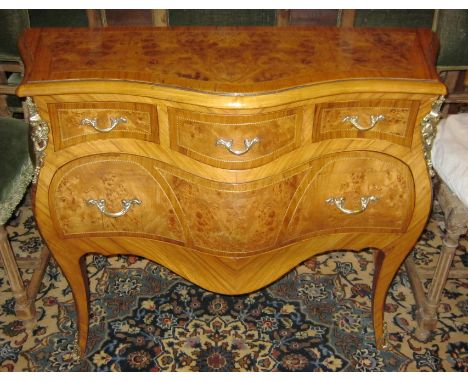 BOMBE COMMODE, Louis XV style burr elm, walnut and gilt metal mounted with crossbanding throughout containing three short and