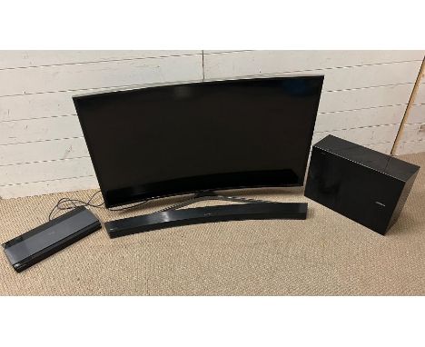 A Samsung curve TV with sound bar model UE48JU6740U