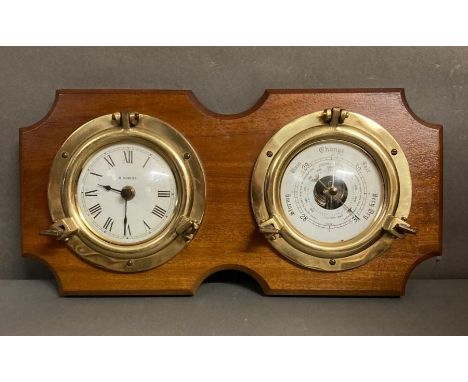A small wall hanging ship clock and barometer 