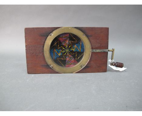 A Late XIX Century Newtons Colour Disc Chromotrope, (Magic Lantern), stamped Carpenter - Westley Regent Street, London 18cm.