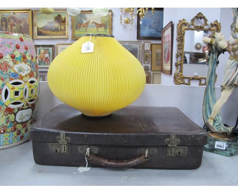 An Early XX Century Dark Brown Leather Suitcase, together with a vintage light shade. (2).