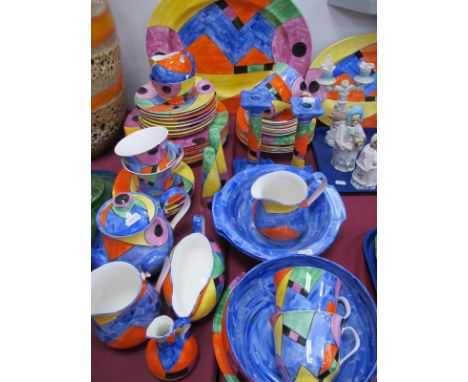 Vicky Price Studio Pottery in the Clarice Cliff Manner, painted in vibrant colours, to include teapot, nine 26.5cm diameter d