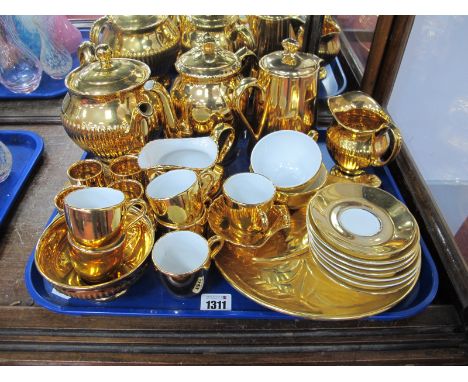 Royal Winton, gilt tea pot, sugar bowl, cream jug, egg cruet, plate, etc, and a Royal Worcester, tea pot, coffee pot, cups, s