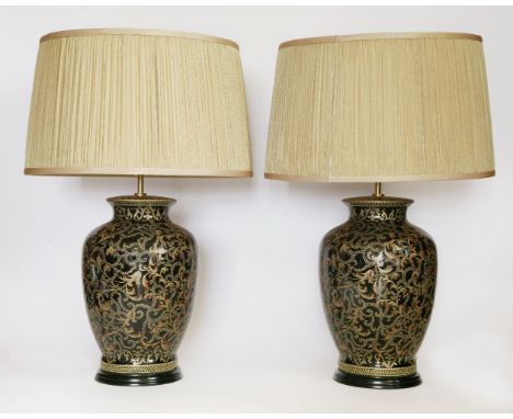 A pair of decorative black-glazed and gilt-decorated pottery vase-shaped electric lamp bases,20th century, with shades,75cm o