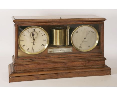 A large walnut cased desktop clock, barometer and barograph,19th century, the case with a glazed front housing a cylindrical 