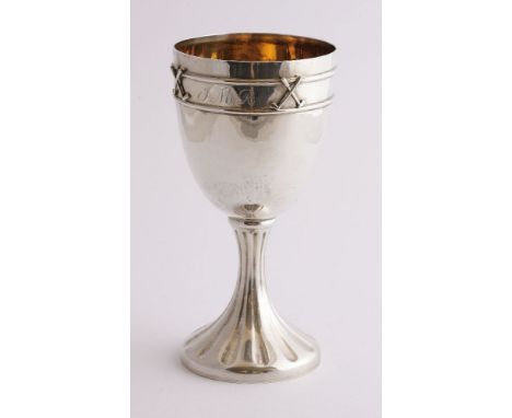 A modern silver goblet, Tom Tudor-Pole, London, 1990,the tapering cylindrical bowl applied with four pairs of crossed golf cl