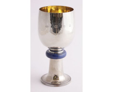 A modern silver goblet, Anthony G Elson, London, 1988,the circular bowl with a hammered finish, on a lapis lazuli knop and tr