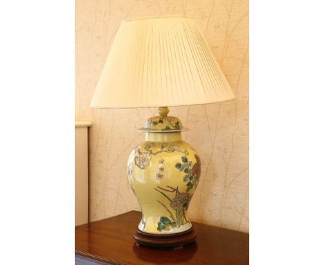 A modern Chinese vase table lamp,mounted on a wooden base, with shade,46cm high