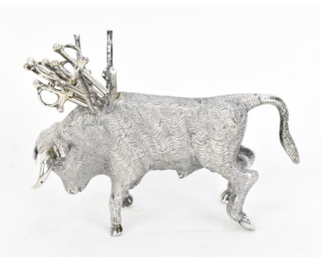 A Continental silver novelty cocktail stick holder modelled as a Toro bull, with sticks shaped as swords, stamped to the side