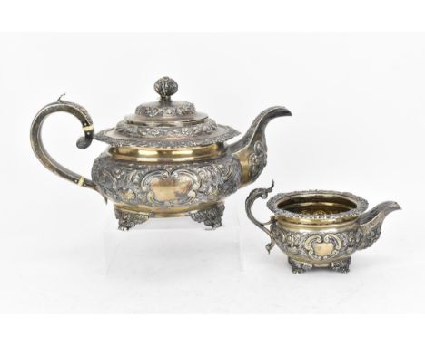 A George IV silver matched teapot and milk jug, the teapot by 'DM', Glasgow 1822, the milk jug by William Stroud, London 1821