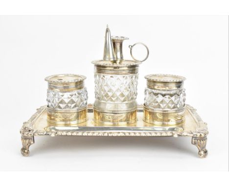 A George III silver inkstand by Rebecca Emes &amp; Edward Barnard I, London 1812, of rectangular form with gadrooned border a