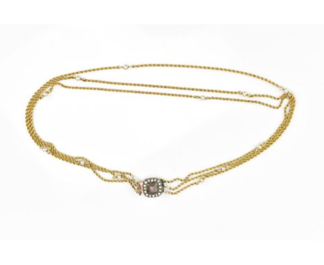 A Victorian yellow metal, pearl and hair mourning choker, with central square aperture with braided hair, with pearl halo, he