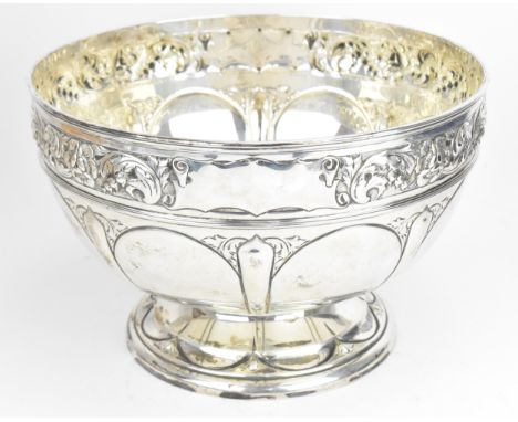 A large George V silver punch bowl, possibly by Harrison Brothers &amp; Howson, London 1912, of circular form with embossed f