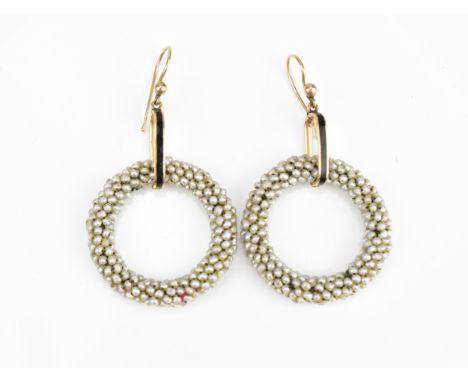 A pair of rose metal, enamel and seed pearl hoop earrings, with clustered seed hoops hanging on a black enamel inlaid oval li