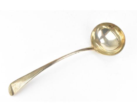 A late Victorian silver ladle by Wakely &amp; Wheeler, London 1899, of plain Old English pattern, 34 cm long, 312g 