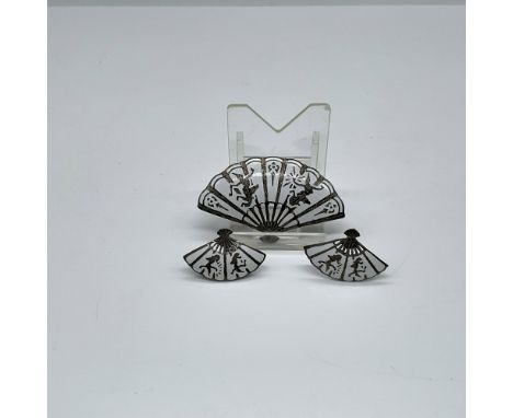 Silver fan jewelry with white enamel design and matching screw back earrings. Fan pin measures 2.25"L and earrings 1.25"L. Si
