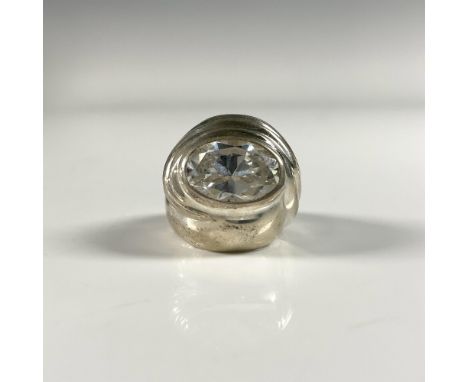 Beautiful silver ring set with a large oval cubic zirconia stone. It is marked sterling inside the band. Size 6. 12g total we