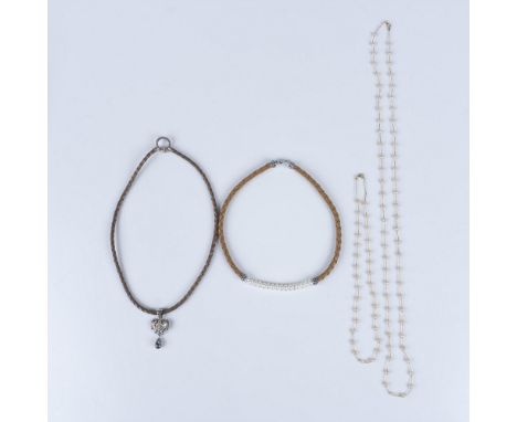 Includes: Two leather necklaces, one is a brown leather with Honora freshwater cultured pearls, sterling ends and closures, m