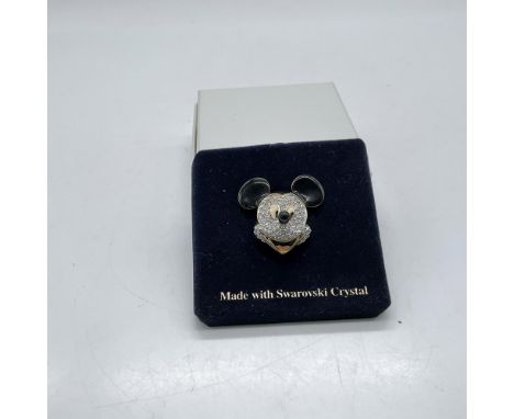 Enameled and gilded face of Mickey embellished with hand-set Swarovski crystal rhinestones. Arribas Bros. and Disney impresse