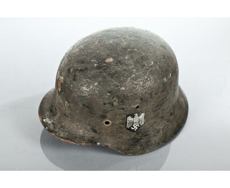 GERMAN WWII DECAL HELMET
later painted, missing strap, original leather lining, 15cm high