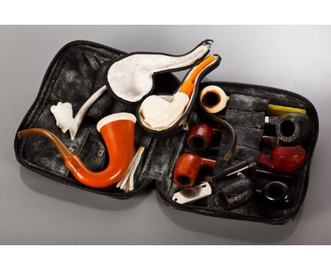 MEERSCHAUM PIPE AND A SELECTION OF DUNHILL AND OTHER PIPES
the bowl of the Meerschaum pipe supported by a carved hand, with a