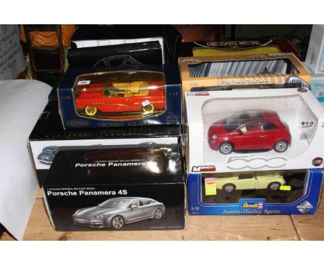 Collection of Diecast model cars in boxes including Revell, Neo, Solido, etc.