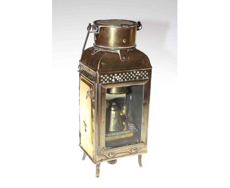 Original brass ships storm lamp by Eli Griffiths 1917, 33cm high.