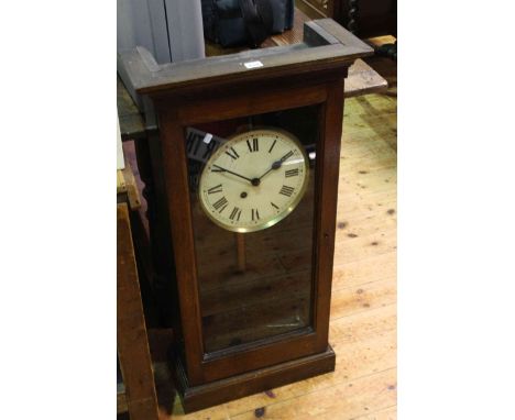 Oak cased wall clock with enamelled dial and fusee movement.