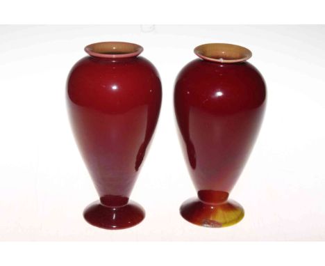 Pair of Linthorpe Pottery red and yellow glazed vases.