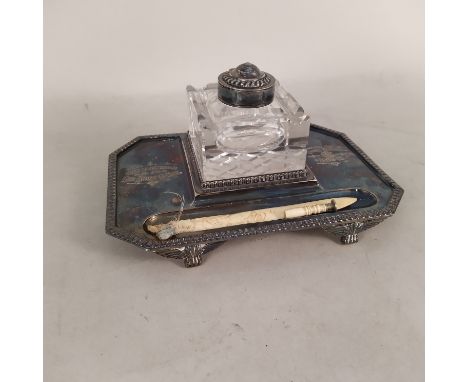 A silver plated and cut glass ink stand, engraved dedication 'A Token of Appreciation to the Rev James Cotton from the Long E