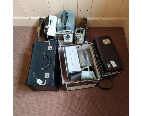 A large selection of vintage cameras and accessories including Canon camera, Hedler de Luxe lights, Aldis slide projector etc