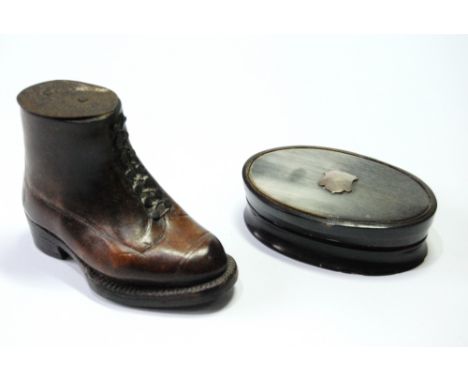 Novelty leather snuff mull in the form of a boot, 8cm, and an oval horn snuff mull with white metal mount, 7cm. Condition Rep