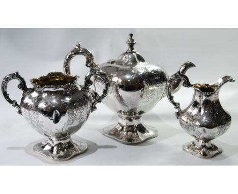 Silver three-piece tea set of quatrefoil lobed form engraved with scrolls, by Charles Lias, 1846, 38oz. Condition Report Gene