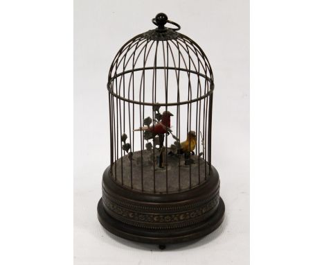 Late 19th century Swiss bird automaton with clockwork movement, the cage with suspension loop, 30cm high. Condition Report Th