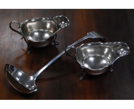 Pair of EP sauce boats of Georgian style and a soup ladle.   (3)