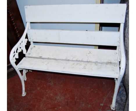 Victorian white painted cast iron bench, 102cm long.