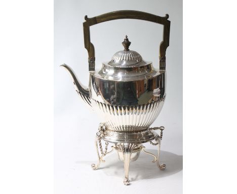 EP tea kettle of boat shape, part-fluted, with stand and lamp, by Elkington, 1890.