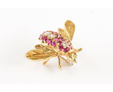 A RUBY AND DIAMOND INSECT BROOCHSet with three round brilliant cut diamonds and fourteen round cut rubies, in the form of a f