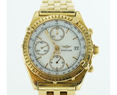 A BREITLING 18CT GOLD AUTOMATIC CHRONOMAT BRACELET WRISTWATCHThe white chronograph dial with three subsidiary dials, baton ho